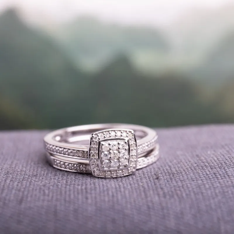 Miadora Sterling Silver 1/4ct TDW Diamond Halo Cluster Bridal Ring Set sold by Zulily