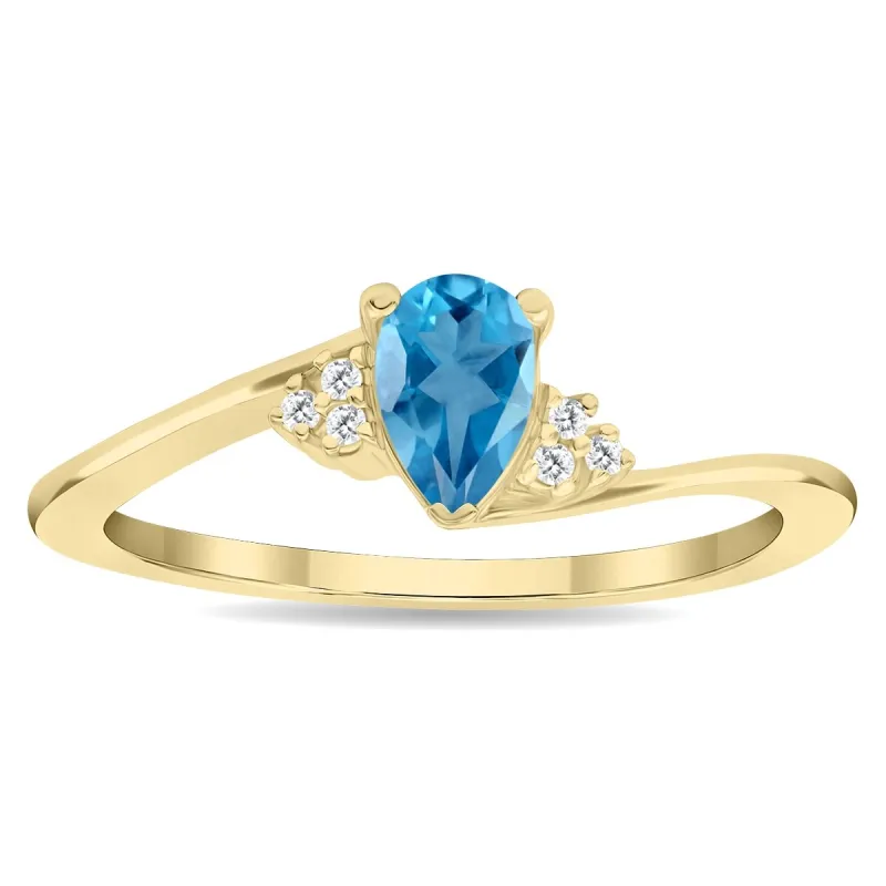 Women's Pear Shaped Blue Topaz and Diamond Tierra Ring in 10K Yellow Gold sold by Zulily