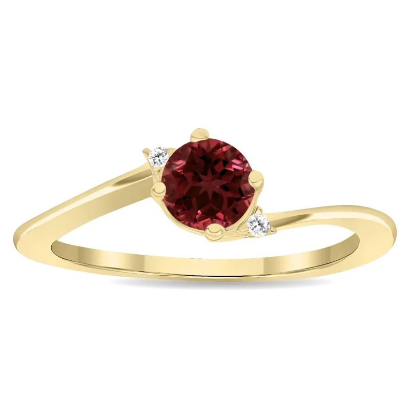 Women's Round Shaped Garnet and Diamond Wave Ring in 10K Yellow Gold sold by Zulily