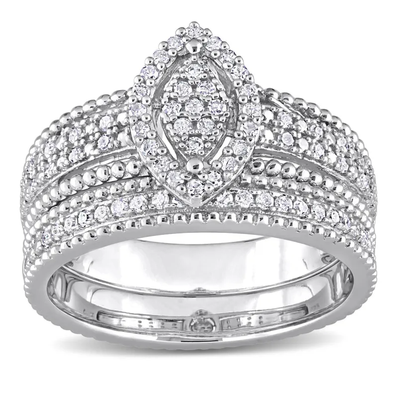 Miadora 10k White Gold Oval-cut Aquamarine and 1/3ct TDW Diamond Halo Split Shank Engagement Ring sold by Zulily