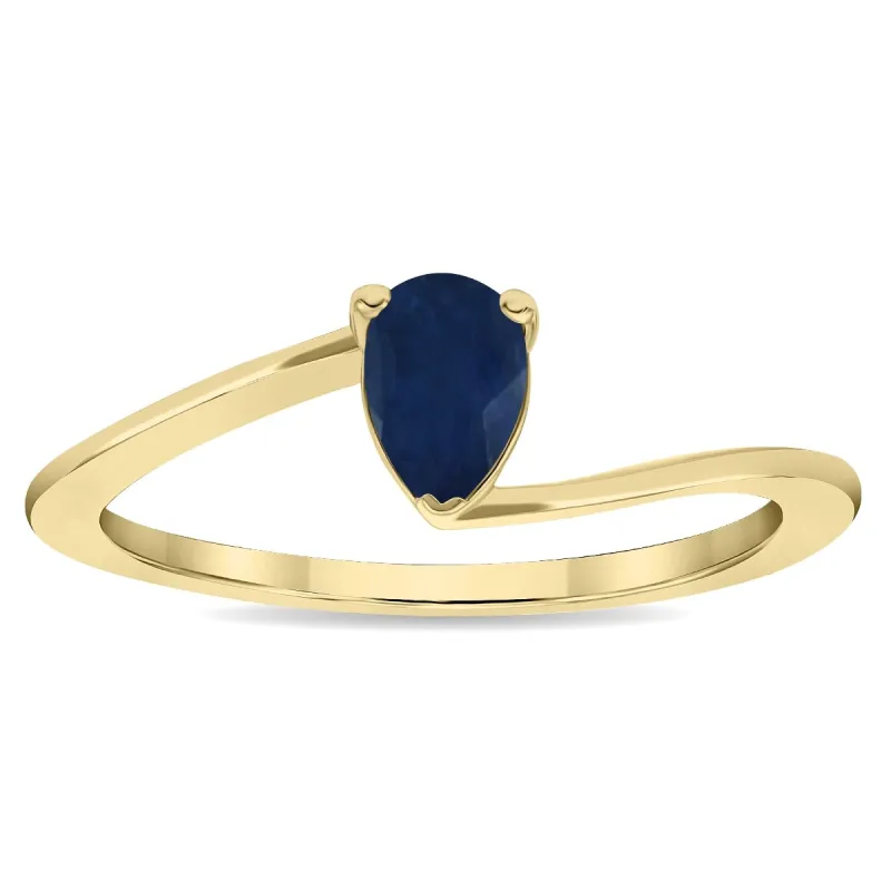 Women's Solitaire Pear Shaped Sapphire Wave Ring in 10K Yellow Gold sold by Zulily