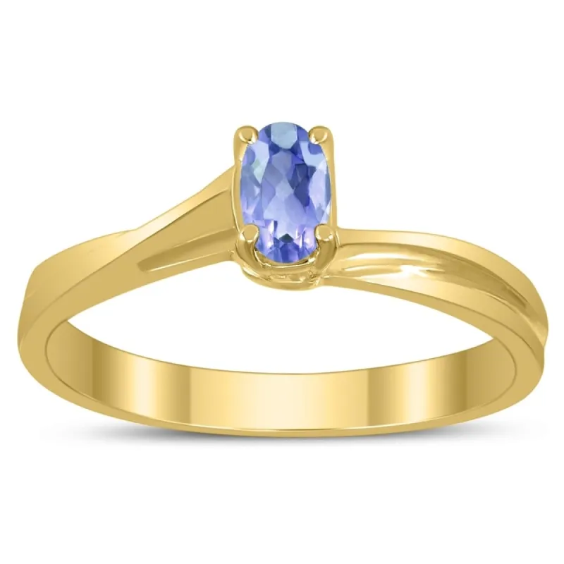 Solitaire Oval 5X3MM Tanzanite Gemstone Twist Ring in 10K Yellow Gold sold by Zulily