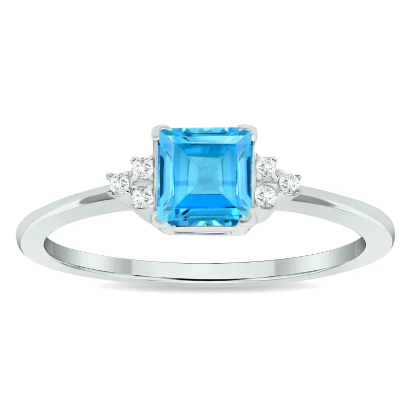 Women's Princess Cut Blue Topaz and Diamond Half Moon Ring in 10K White Gold sold by Zulily