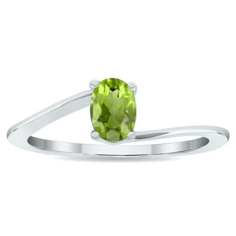 Women's Solitaire Peridot Wave Ring in 10K White Gold sold by Zulily