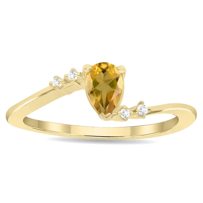 Women's Pear Shaped Citrine and Diamond Wave Ring in 10K Yellow Gold sold by Zulily