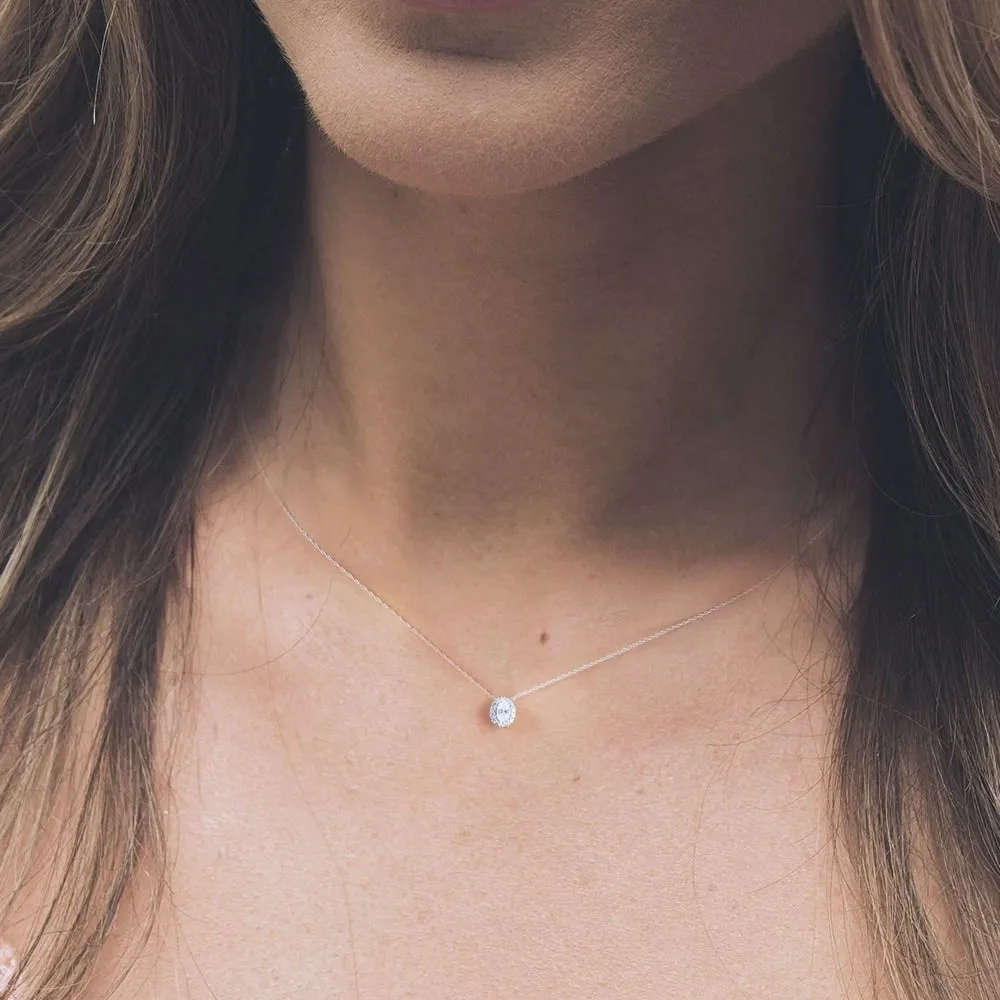 1/6ct TDW Oval Shape Diamond Halo Necklace in 10k Gold by De Couer sold by Zulily product image thumbnail 3