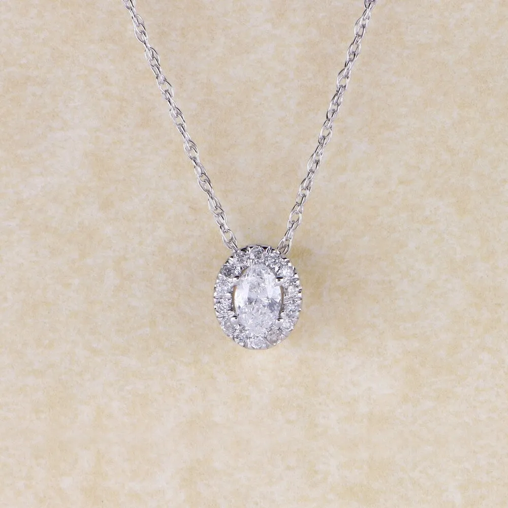 1/6ct TDW Oval Shape Diamond Halo Necklace in 10k Gold by De Couer sold by Zulily