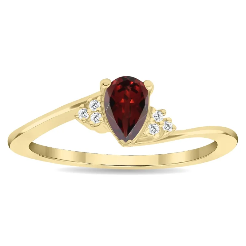Women's Pear Shaped Garnet and Diamond Tierra Ring in 10K Yellow Gold sold by Zulily