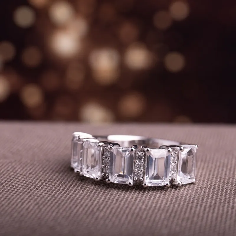 Miadora 10k White Gold Created White Sapphire and 1/10ct TDW Diamond Octagon-Cut Anniversary Band sold by Zulily