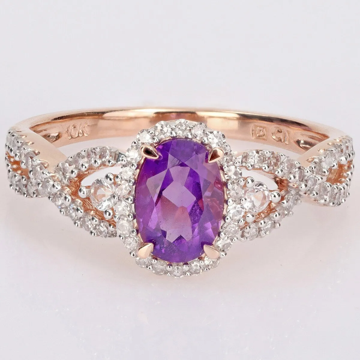 Miadora 10k Rose Gold Amethyst, White Sapphire and 1/3ct TDW Diamond Halo Infinity Ring sold by Zulily