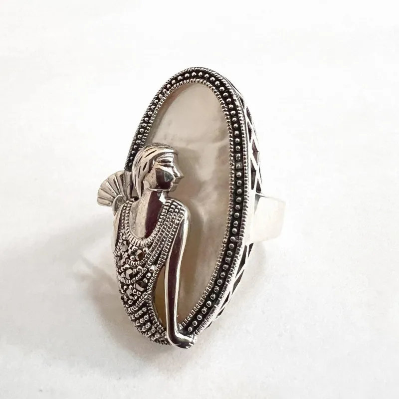 Tang & Song Sterling Silver and Marcasite Lady In the Mirror Oval Mother of Pearl Ring sold by Zulily