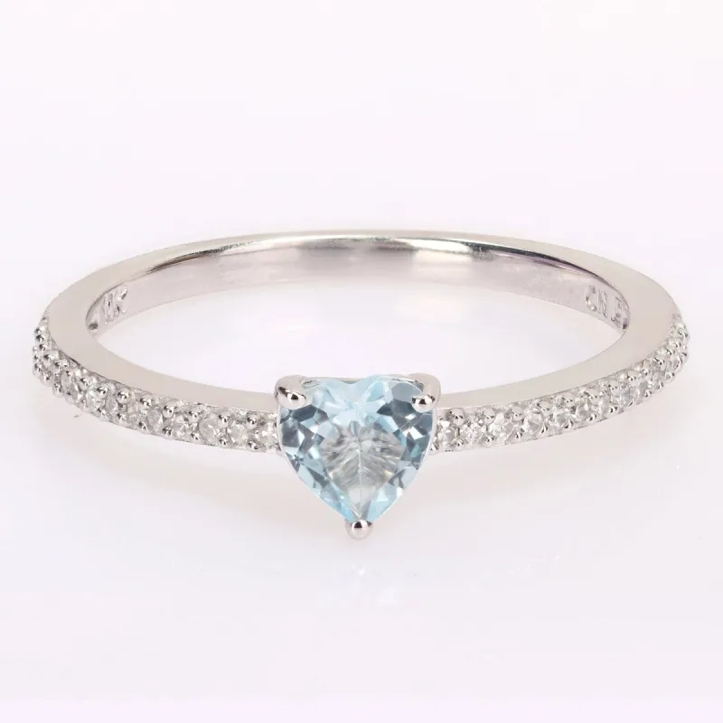 Miadora 10k White Gold Heart-cut Blue Topaz and 1/10ct TDW Diamond Birthstone Ring sold by Zulily