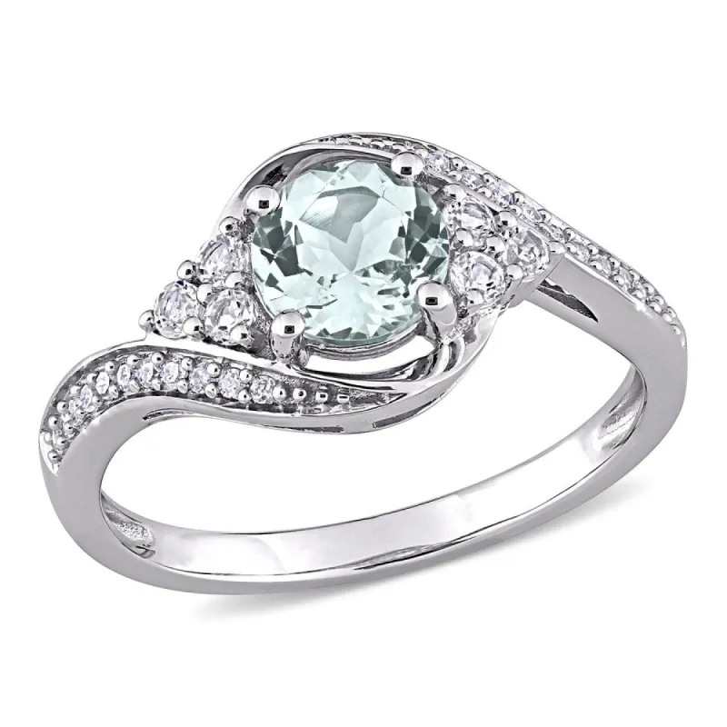 Miadora 10k White Gold Aquamarine, White Topaz and 1/10ct TDW Diamond Bypass Engagement Ring sold by Zulily