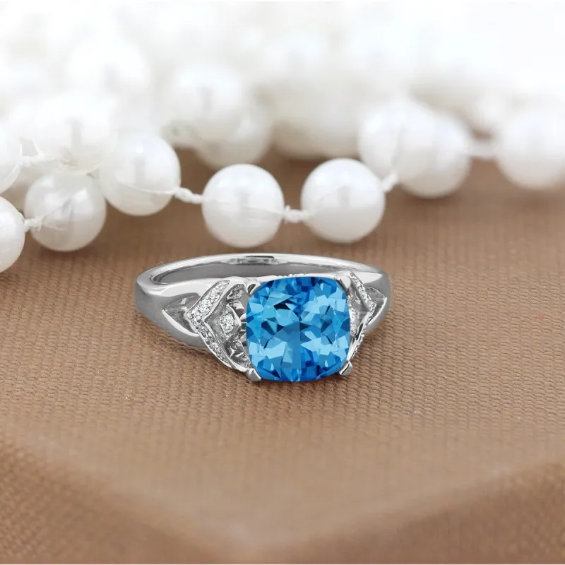 Auriya Modern 2 3/8ct Cushion-cut Swiss Blue Topaz and Diamond Engagement Ring 1/6ctw 14k Gold sold by Zulily