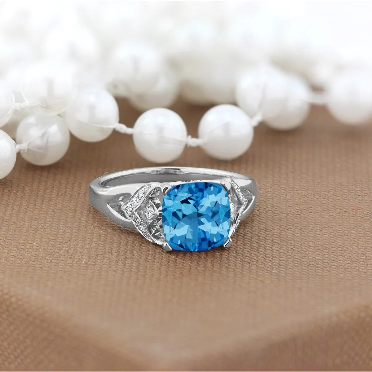 Auriya Modern 2 3/8ct Cushion-cut Swiss Blue Topaz and Diamond Engagement Ring 1/6ctw 14k Gold sold by Zulily