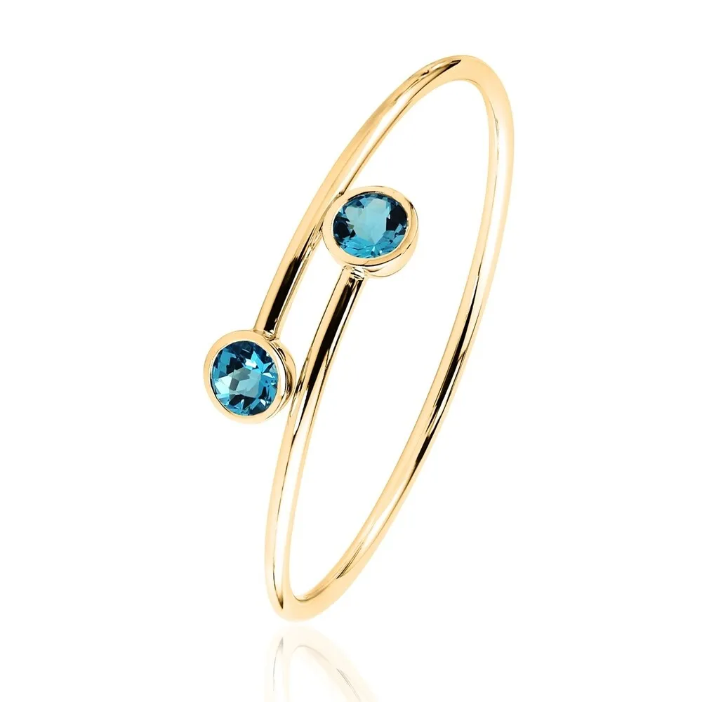 Stackable 4ct Round Swiss-Blue Topaz Bypass Bangle Bracelet by Auriya in Gold over Silver sold by Zulily product image thumbnail 5