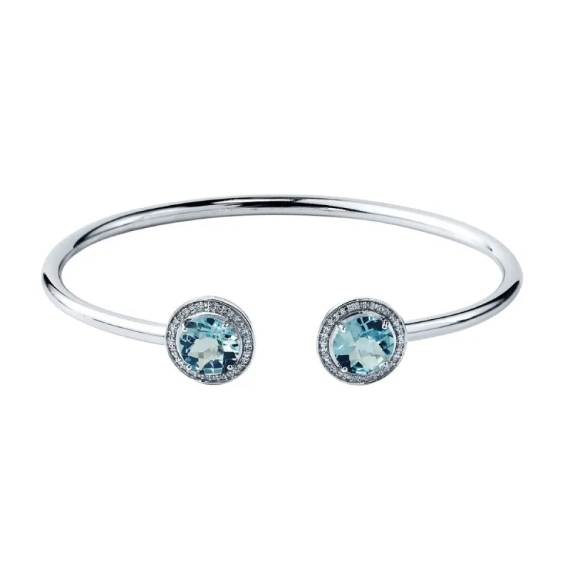 Auriya 4ct Sky-Blue Topaz Gold over Silver Bangle Bracelet with Diamond Accents sold by Zulily