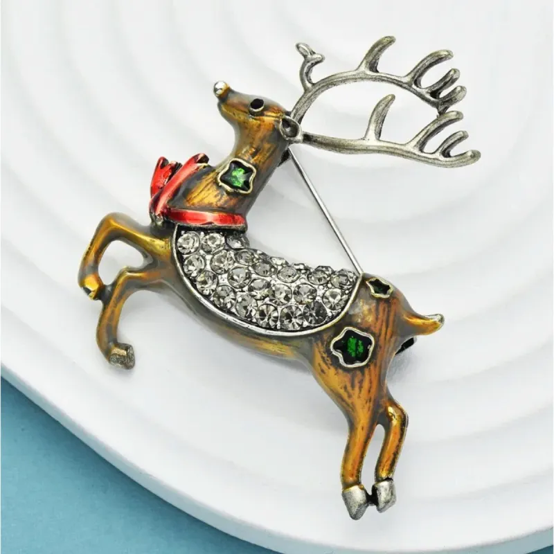 Don't AsK Antique Gold-tone with Clear Crystals and Enamel Accents Prancing Reindeer Brooch sold by Zulily