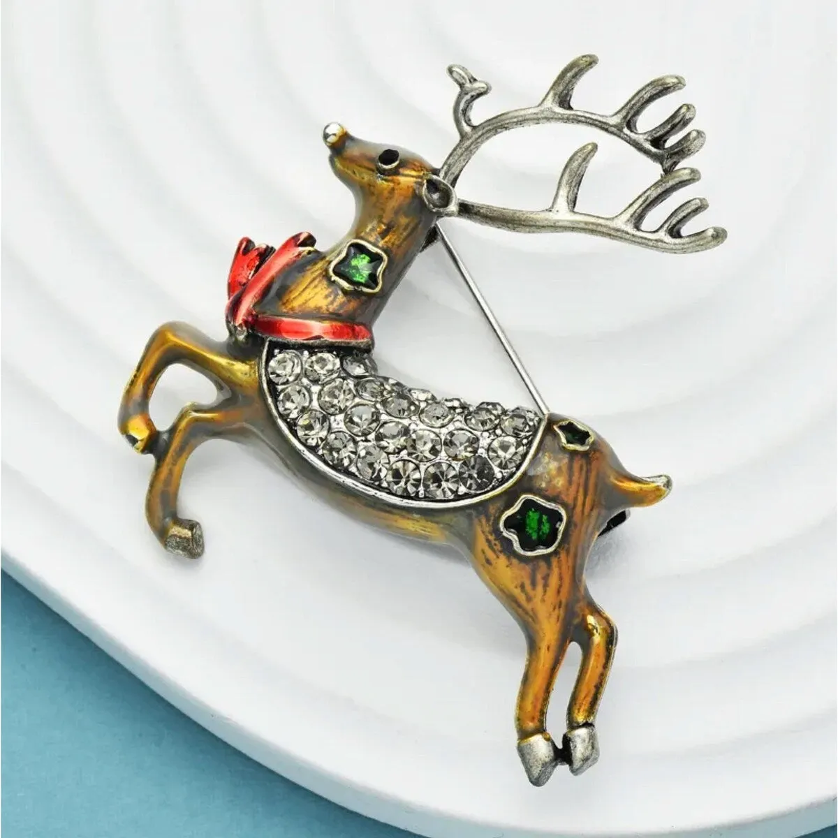 Don't AsK Antique Gold-tone with Clear Crystals and Enamel Accents Prancing Reindeer Brooch sold by Zulily