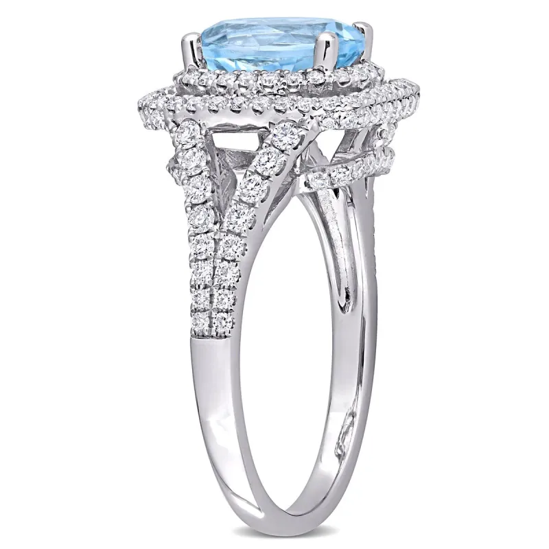 Miadora 14k White Gold Oval-cut Blue Topaz and 4/5ct TDW Diamond Halo Split Shank Cocktail Ring sold by Zulily