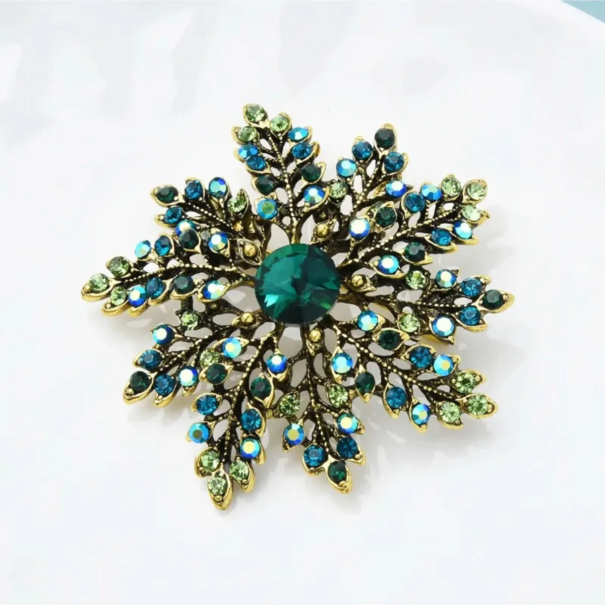 Don't AsK Vintage Green Snowflake Brooch Pin sold by Zulily