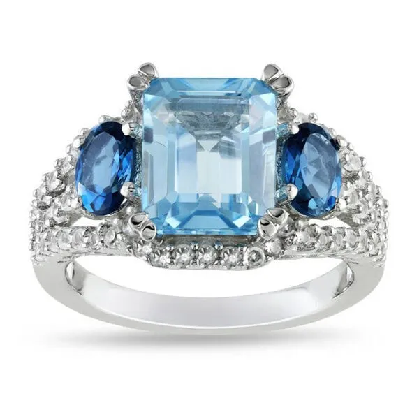 Miadora Sterling Silver Topaz and Created Sapphire 3-stone Halo Cocktail Ring sold by Zulily