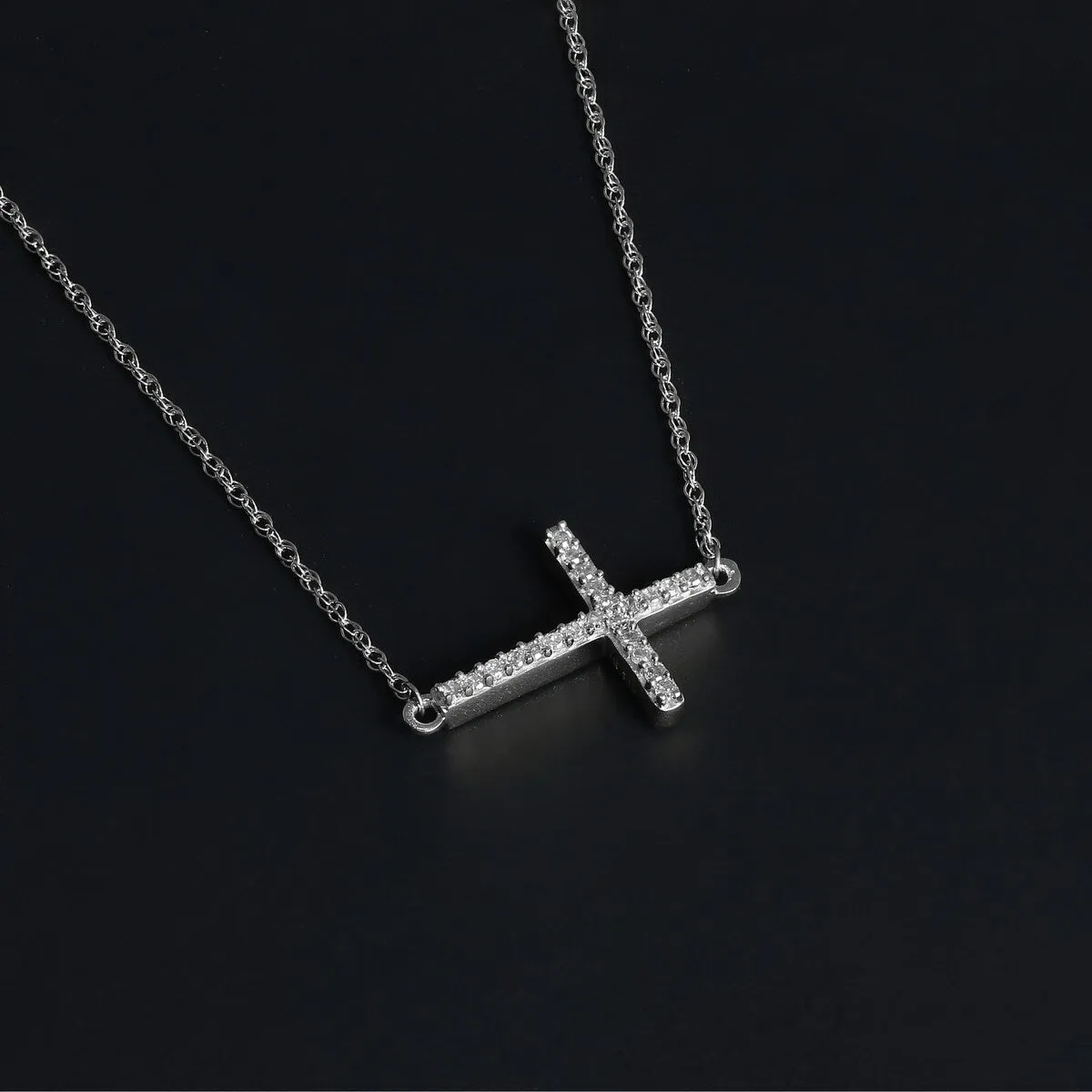 De Couer 10k Gold 1/20ct TDW Diamond Cross Necklace sold by Zulily
