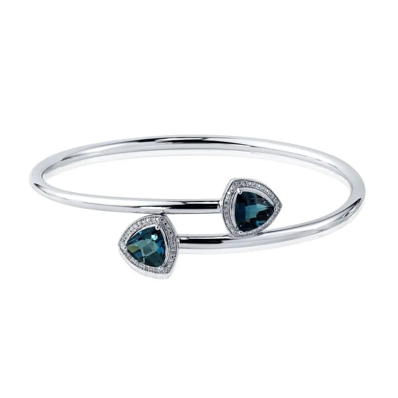 Auriya 3 3/4ct Trillion-Cut London-Blue Topaz Gold over Silver Bangle Bracelet with Diamond Accents sold by Zulily