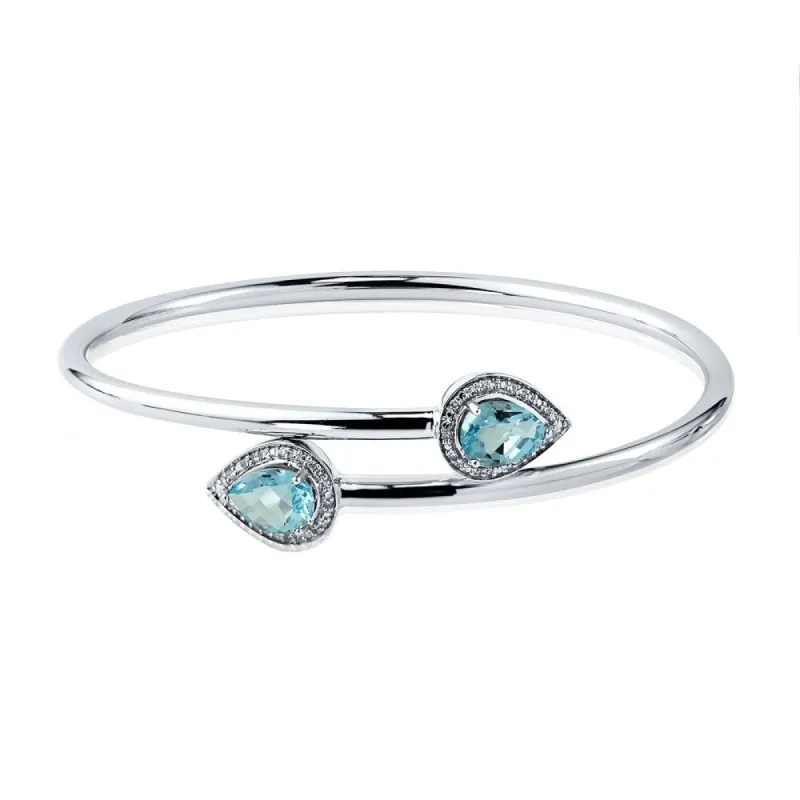 Auriya 2 1/2ct Pear-Shaped Sky-Blue Topaz Gold over Silver Bangle Bracelet with Diamond Accents sold by Zulily