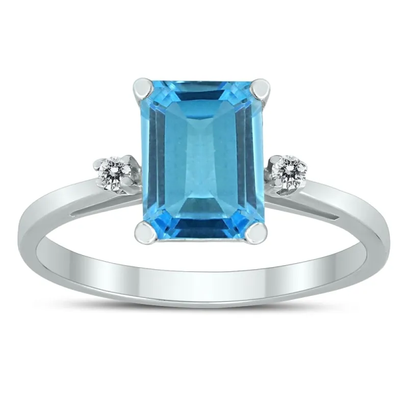Emerald Cut 8X6MM Blue Topaz and Diamond Three Stone Ring in 10K White Gold sold by Zulily