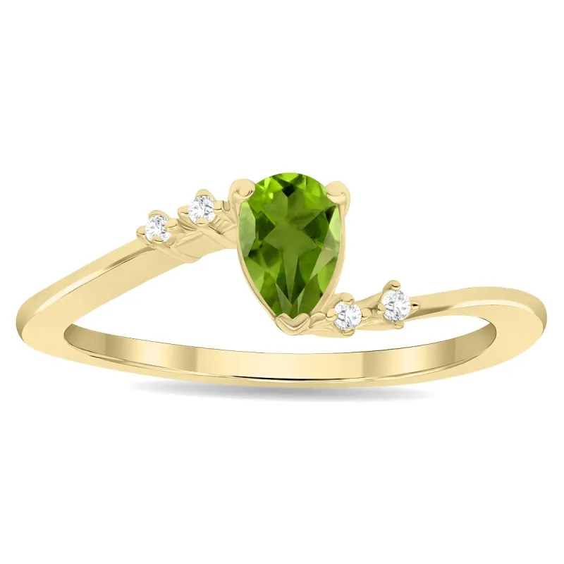 Women's Pear Shaped Peridot and Diamond Wave Ring in 10K Yellow Gold sold by Zulily