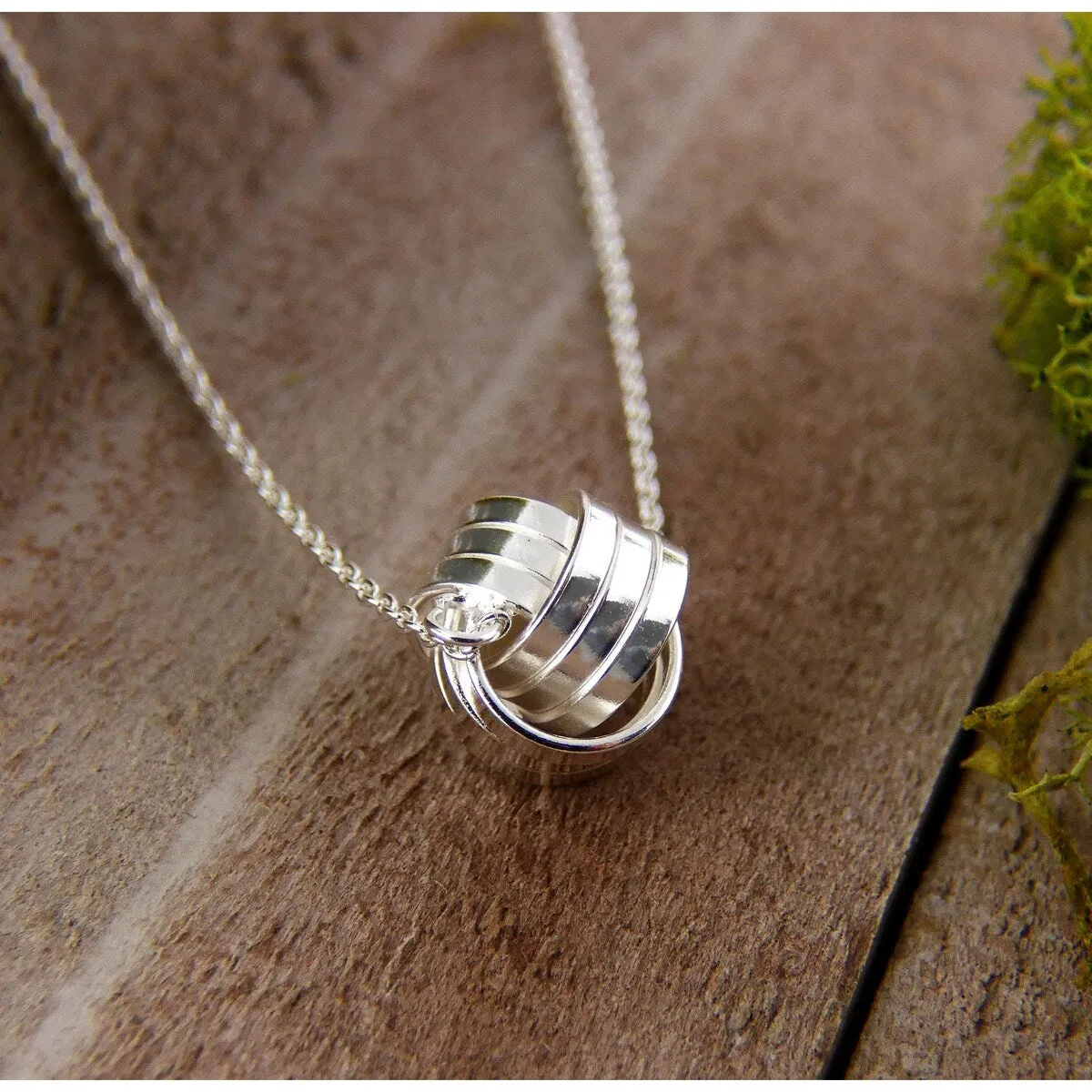 Vera & Co. Sterling Silver Love Knot Necklace sold by Zulily