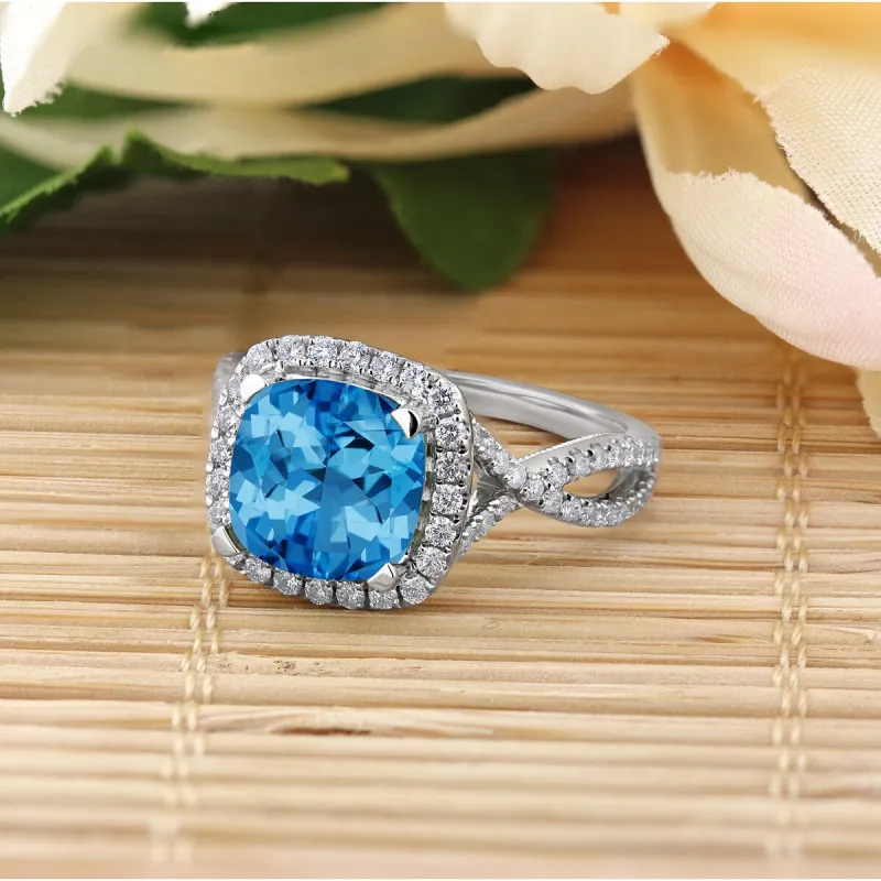 Auriya 3 1/8ct Cushion-cut Swiss Blue Topaz and Halo Diamond Engagement Ring 1/2cttw 14k Gold sold by Zulily