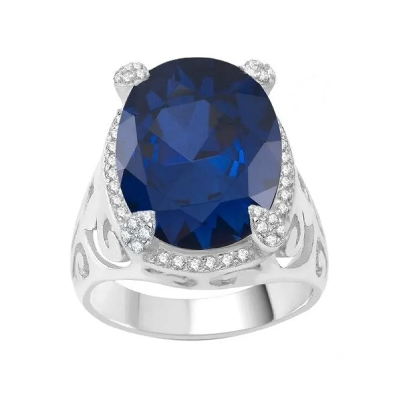 Sterling Silver with Blue Sapphire and Natural White Topaz Halo Ring sold by Zulily