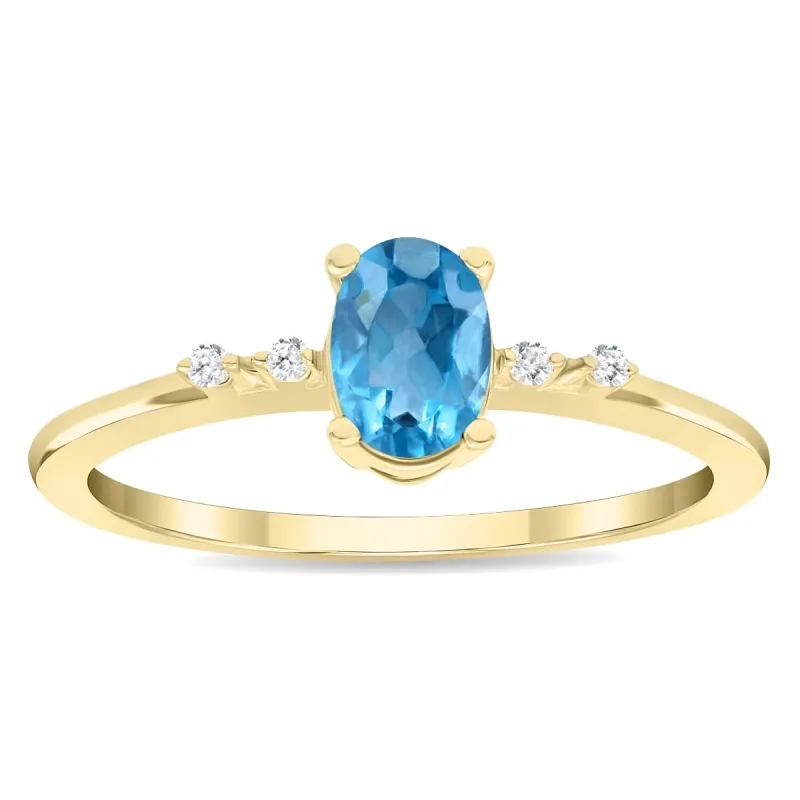 Women's Oval Shaped Blue Topaz and Diamond Sparkle Ring in 10K Yellow Gold sold by Zulily