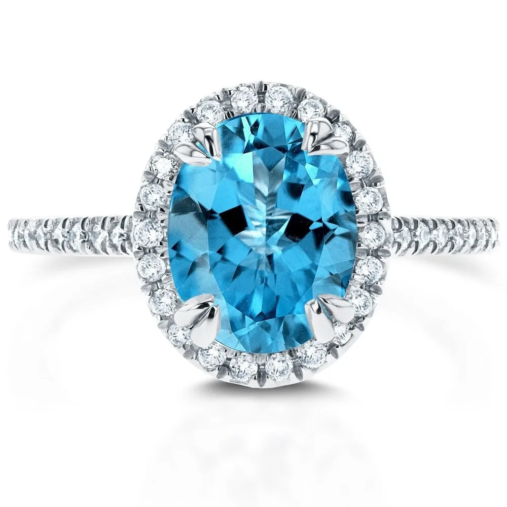Annello by Kobelli 14k Gold 2 1/4ct TGW Oval Cut Swiss Blue Topaz and Diamond Halo Gemstone Ring sold by Zulily