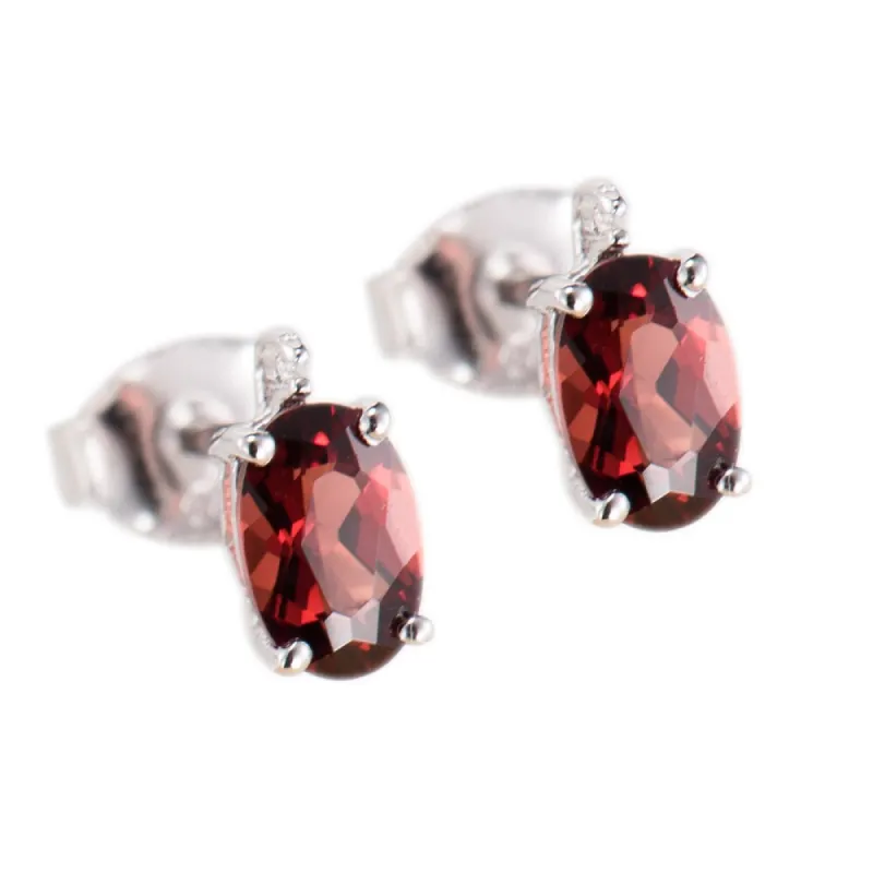 Sterling Silver 1.33 ct Oval Garnet and White Diamond Stud Earring sold by Zulily