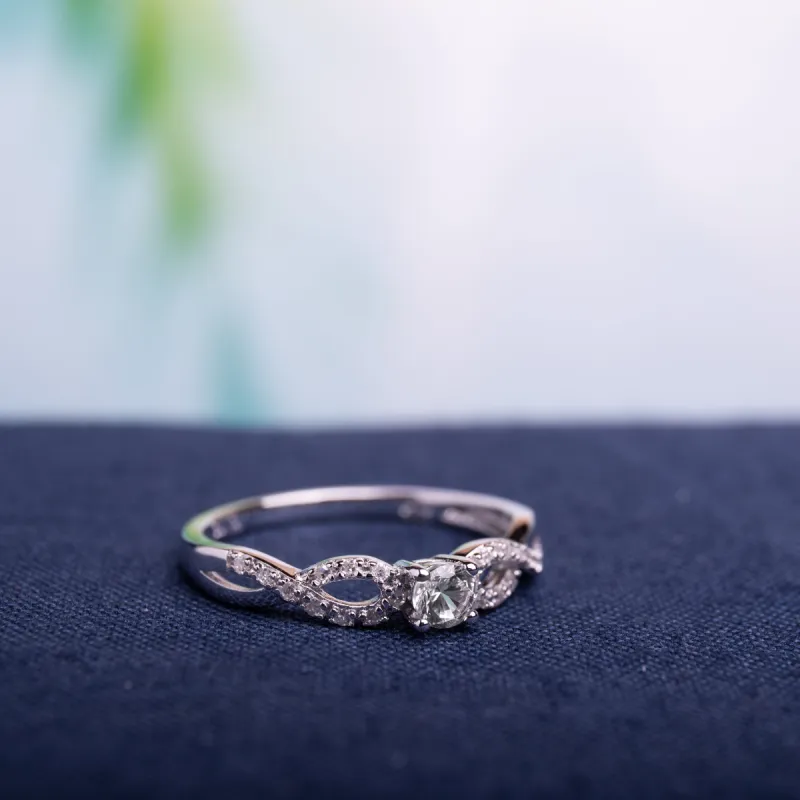 Miadora Sterling Silver Created White Sapphire and 1/10ct TDW Diamond Infinity Promise Ring sold by Zulily