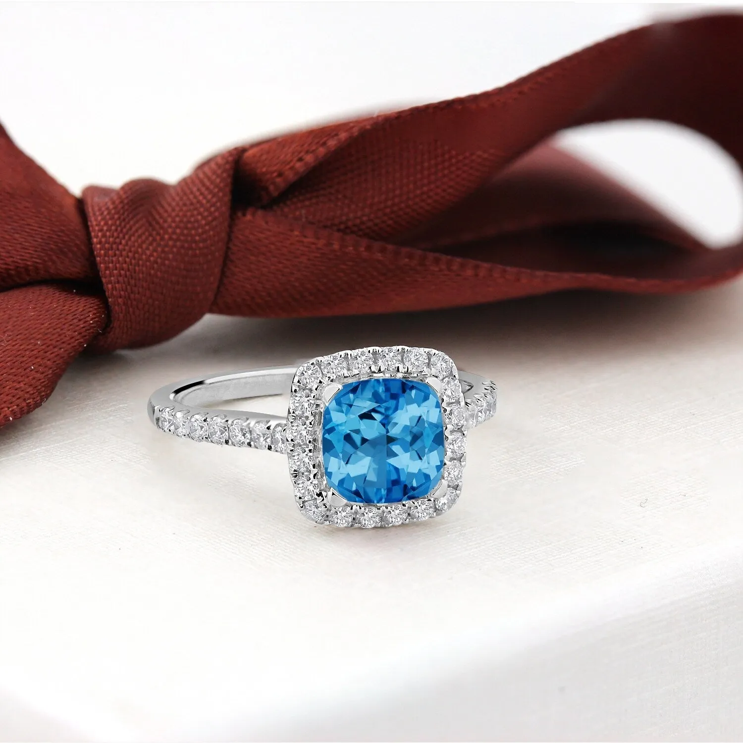 Auriya 1 1/4ct Cushion-cut Swiss Blue Topaz and Halo Diamond Engagement Ring 1/2cttw 14k Gold sold by Zulily