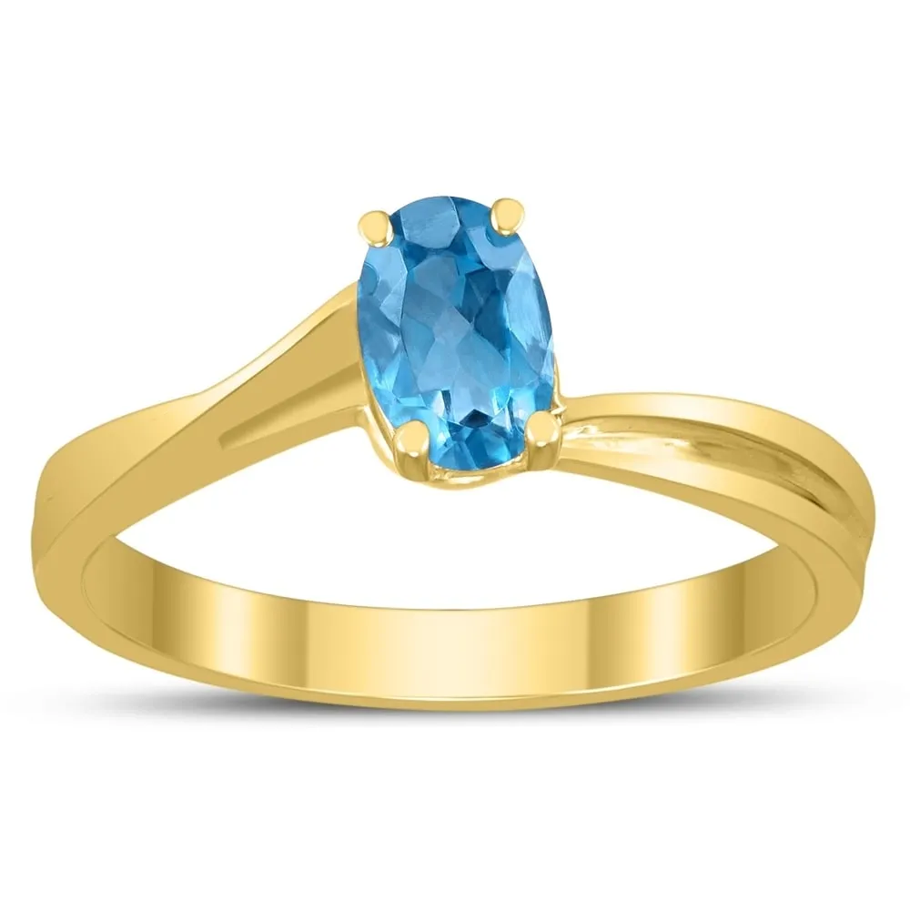 Solitaire Oval 6X4MM Blue Topaz Gemstone Twist Ring in 10K Yellow Gold sold by Zulily