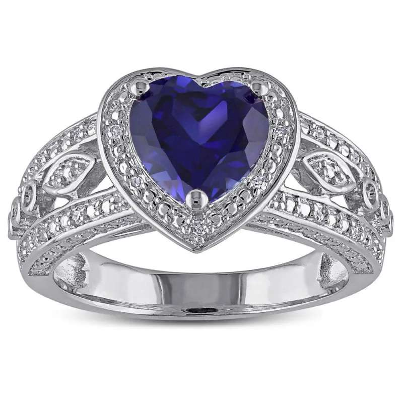 Miadora Sterling Silver Created Blue Sapphire and 1/10ct TDW Diamond Heart Halo Ring sold by Zulily