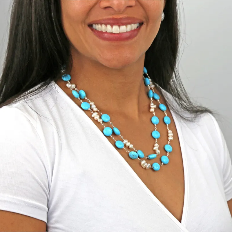 A magnesite turquoise and cultured freshwater pearl wire-wrapped statement necklace. sold by Zulily