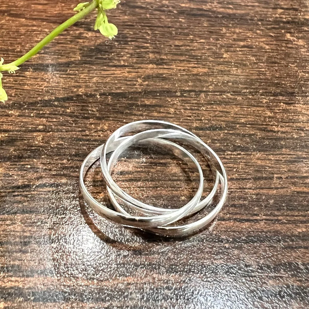 Vera & Co. Sterling Silver Triple Band Interlock Ring sold by Zulily