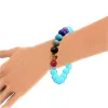 Turquoise and Chakra Bead Stretch Bracelet sold by Zulily