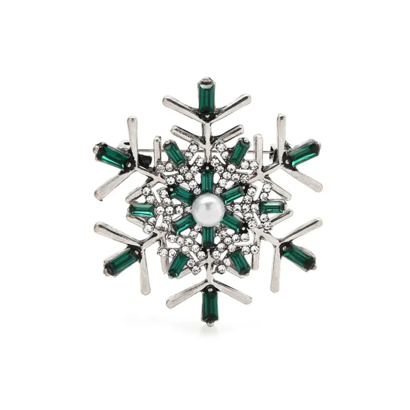 Green & Clear Crystal Snowflake Brooch sold by Zulily