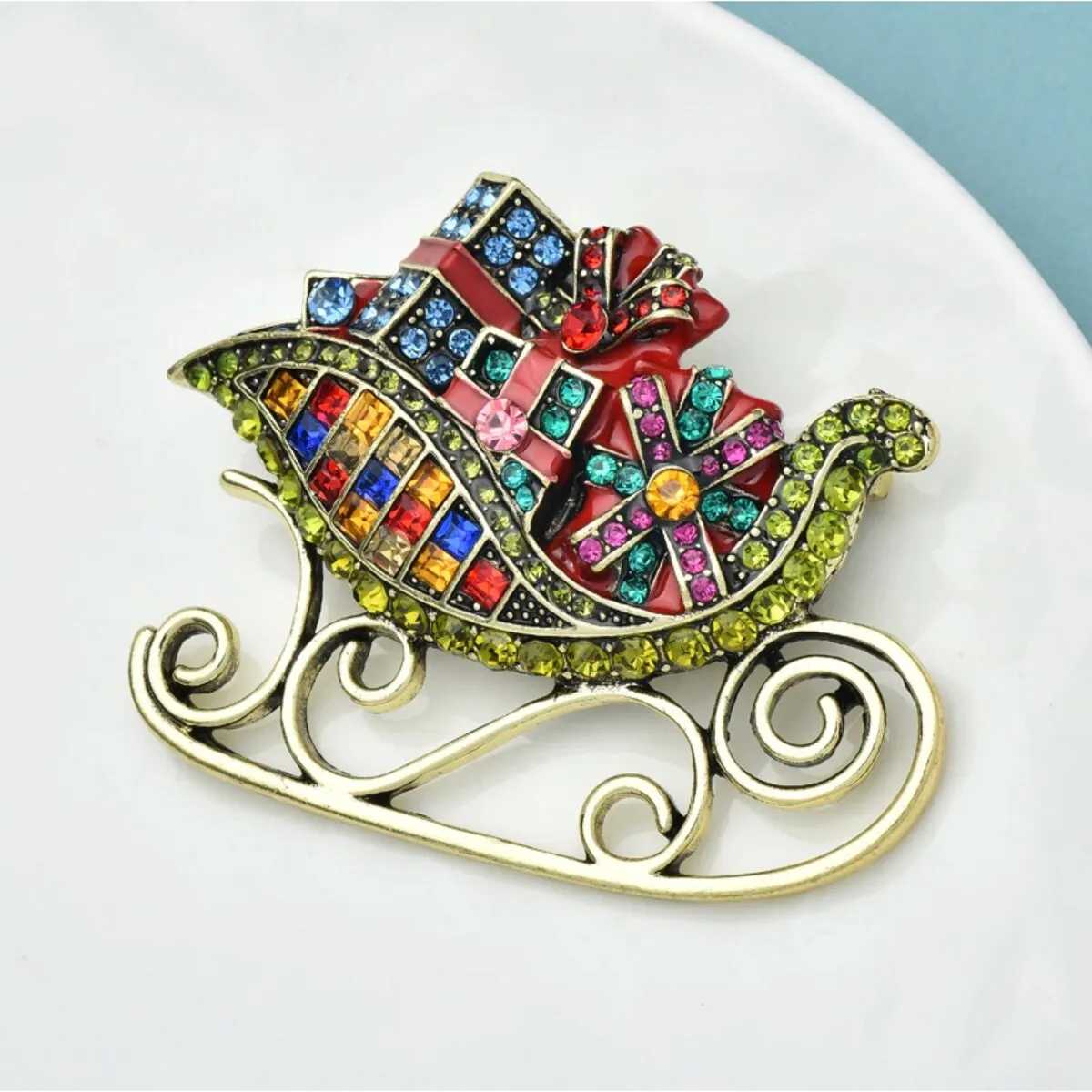 Multi Coloured Crystal Christmas Sleigh Brooch sold by Zulily product image thumbnail 2