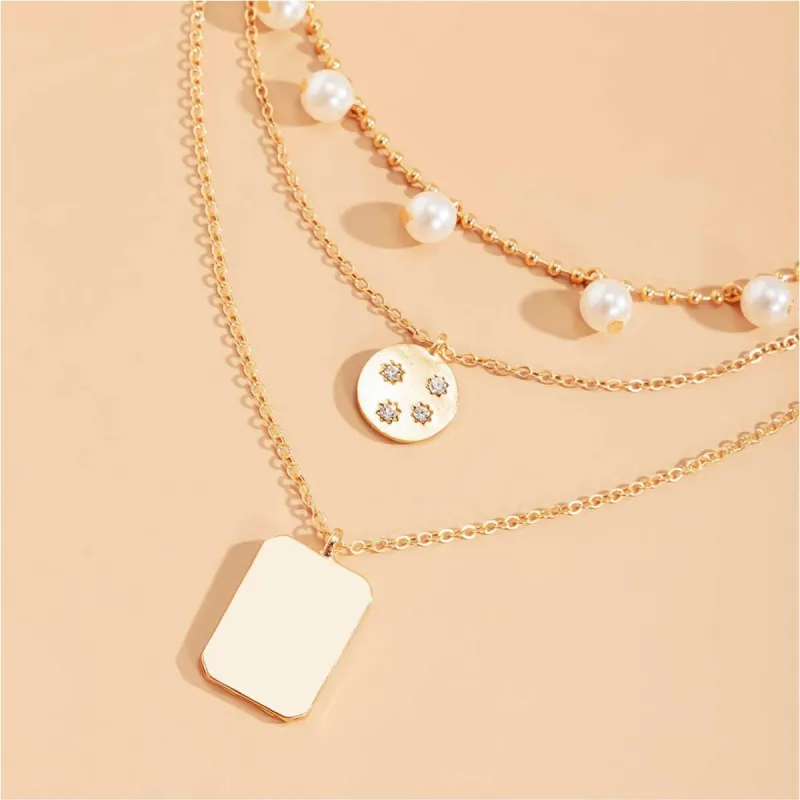 Goldtone Multi Layered Disk And Rectangular Necklace With Pearls And Crystals - White sold by Zulily