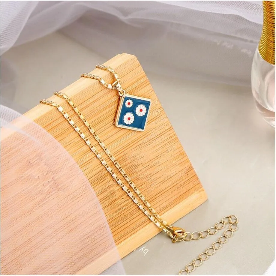 Goldtone Blue Daisies Pendant Necklace - White sold by Zulily