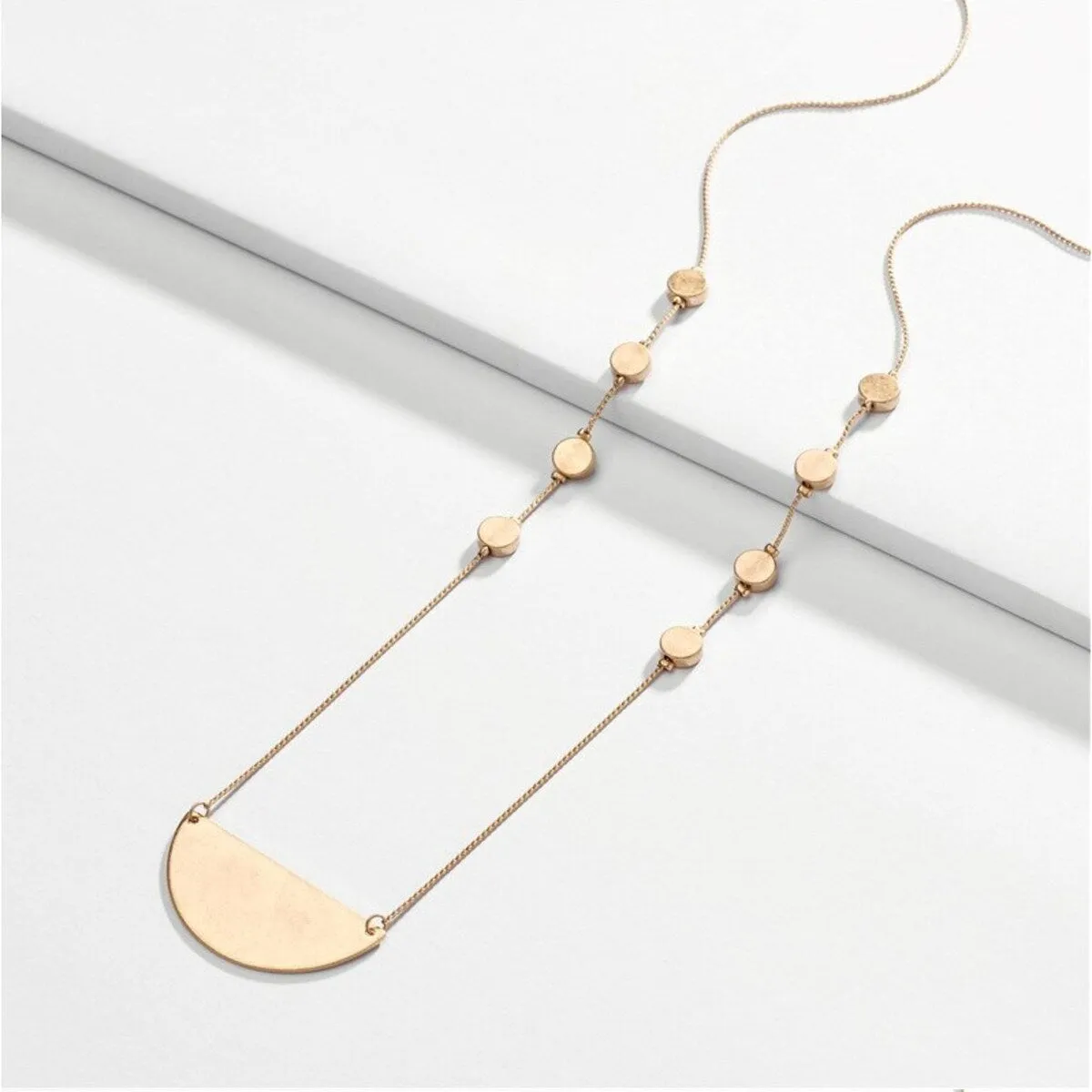 Goldtone Semi-circle Necklace - White sold by Zulily
