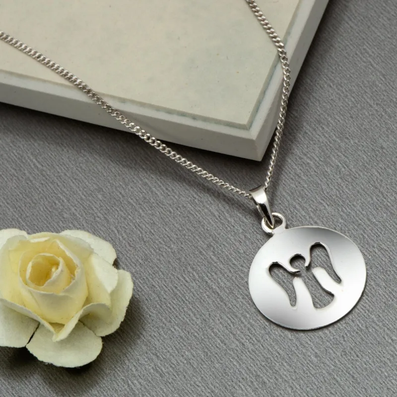 Sterling Silver Cutout Angel Round Pendant - White sold by Zulily